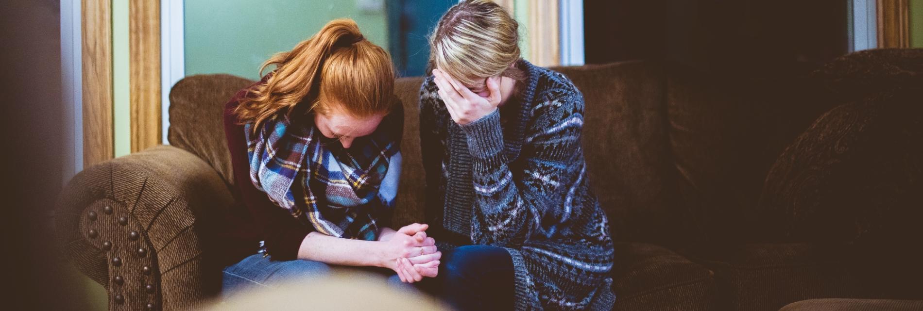 two people praying